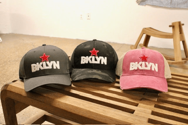 https://bricartsmedia.org/wp-content/uploads/2025/05/enamoo-BKLYNStarTruckerHats-copy-1.png