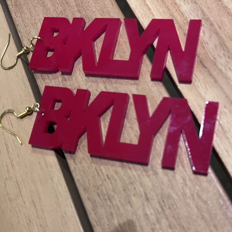 https://bricartsmedia.org/wp-content/uploads/2025/05/The-Collective-at-IndigoStyle-BKLYN-Acrylic-Earrings-red-copy.jpg